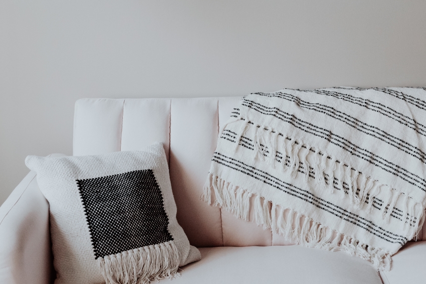 Comfy Looking Couch with Cushions in Tribal Patterns