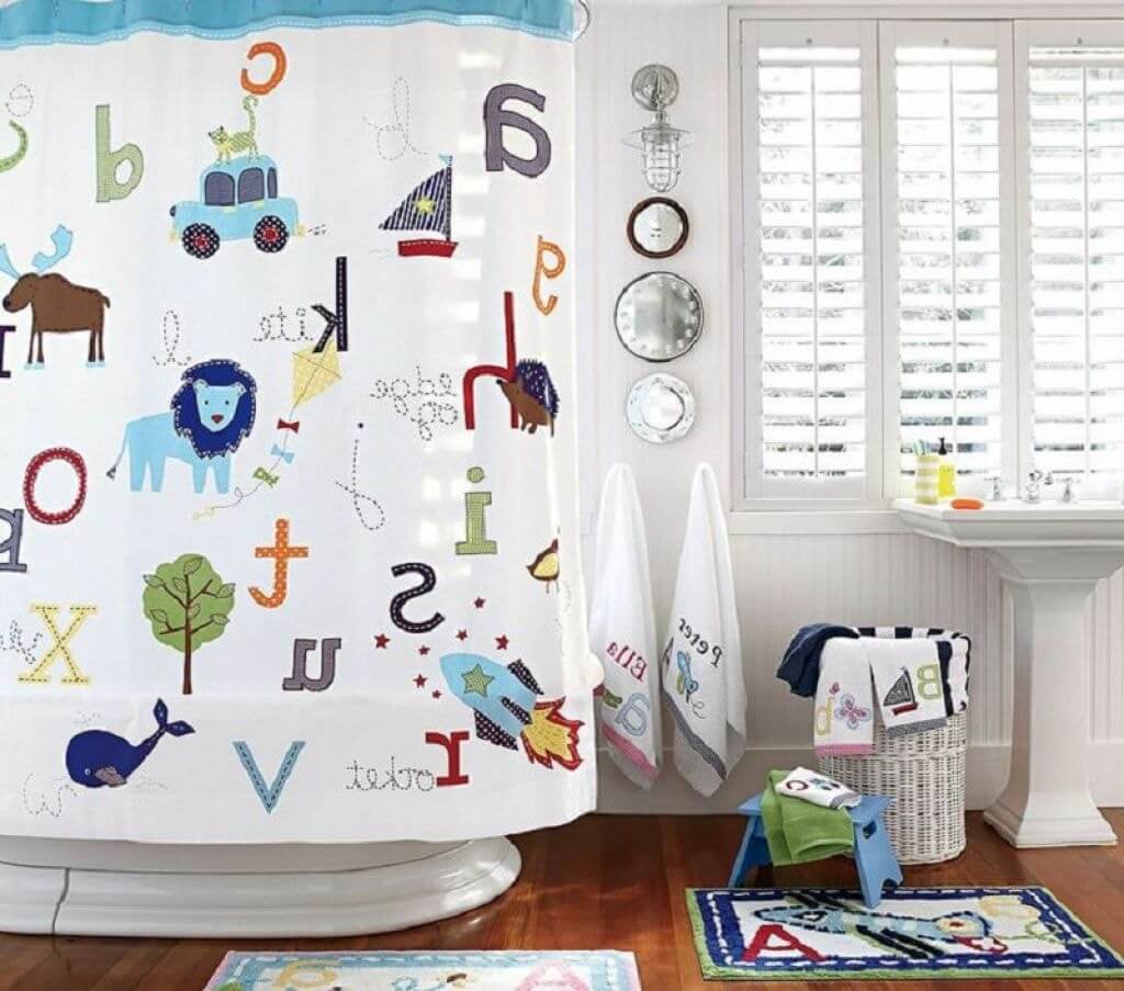 Simple-Bathroom-for-Kids-with-Alphabet-Theme-Shower-Curtain-and-White-Free-Standing-Sink