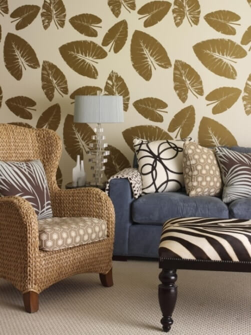 tara-seawright-gold-leaf-wallpaper-living-room-zebra-ottoman-wicker-chair
