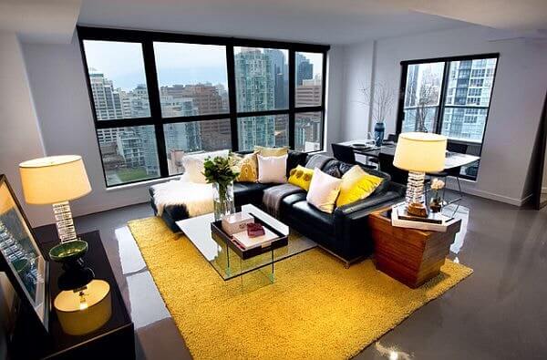 terrific-living-room-with-black-couch-in-contrast-with-a-yellow-rug