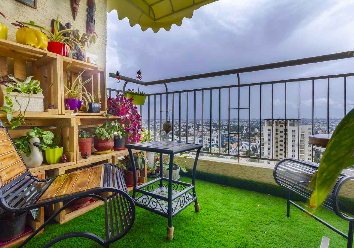 Seating Amidst Florals - Balcony Decoration Ideas