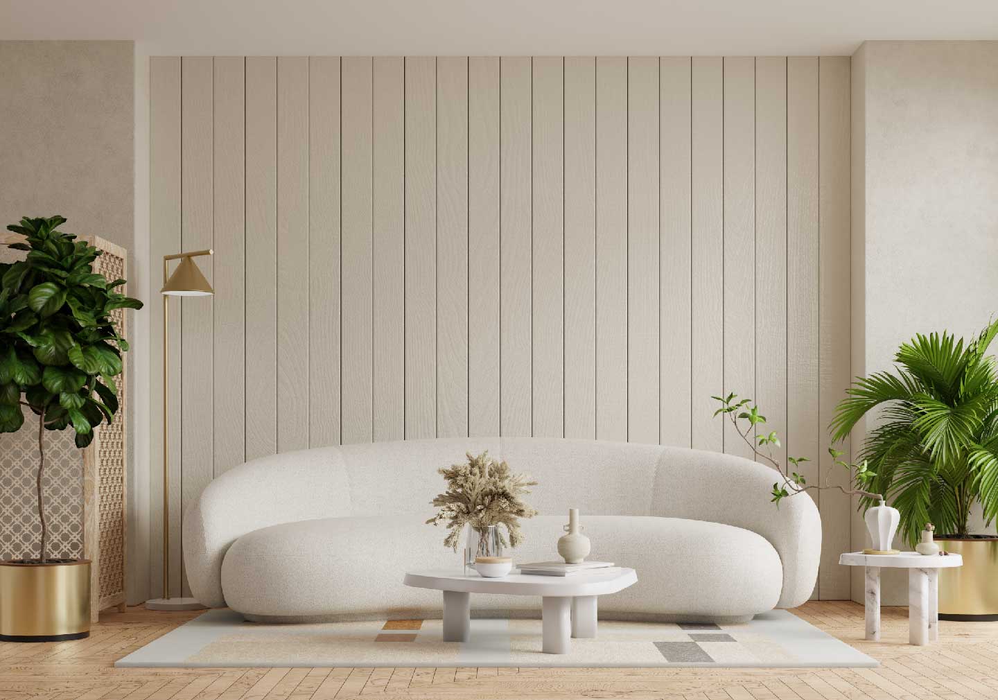 living room interior Designs - white round shaped couch with coffee table and side plants
