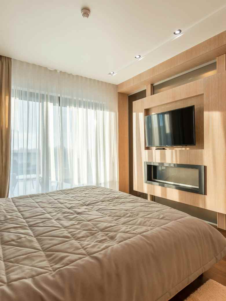 Space Optimization: TV Unit Designs for Small Bedrooms